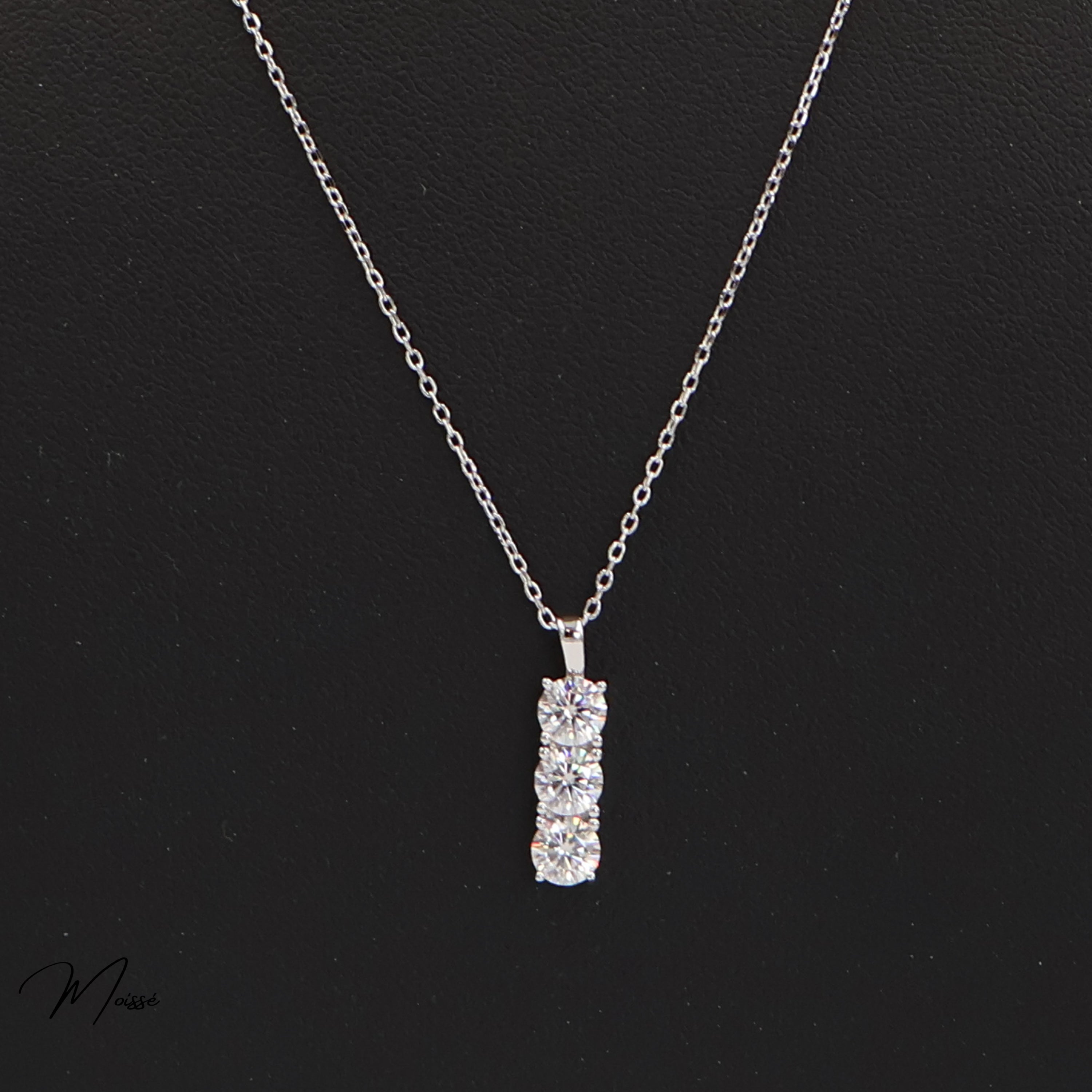 Moissanite necklace on a black background